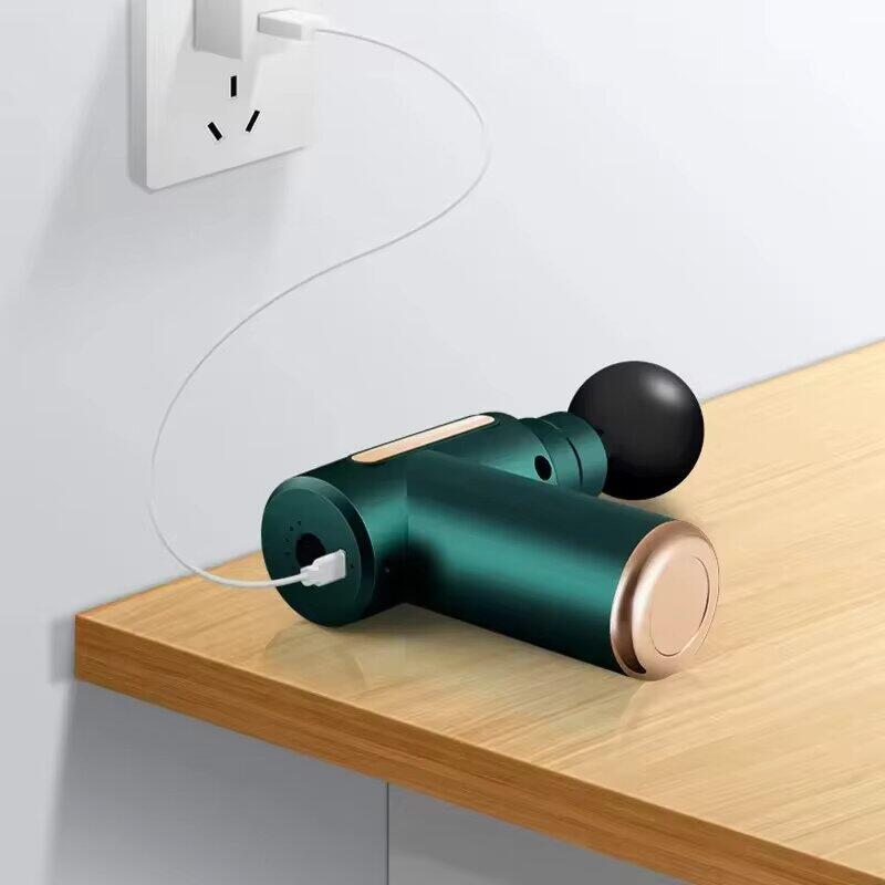 Mini pistola de masaje con botón y 4 cabezales